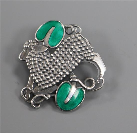 A Danish Georg Jensen sterling silver and enamel sheep brooch, no 284, 33mm.